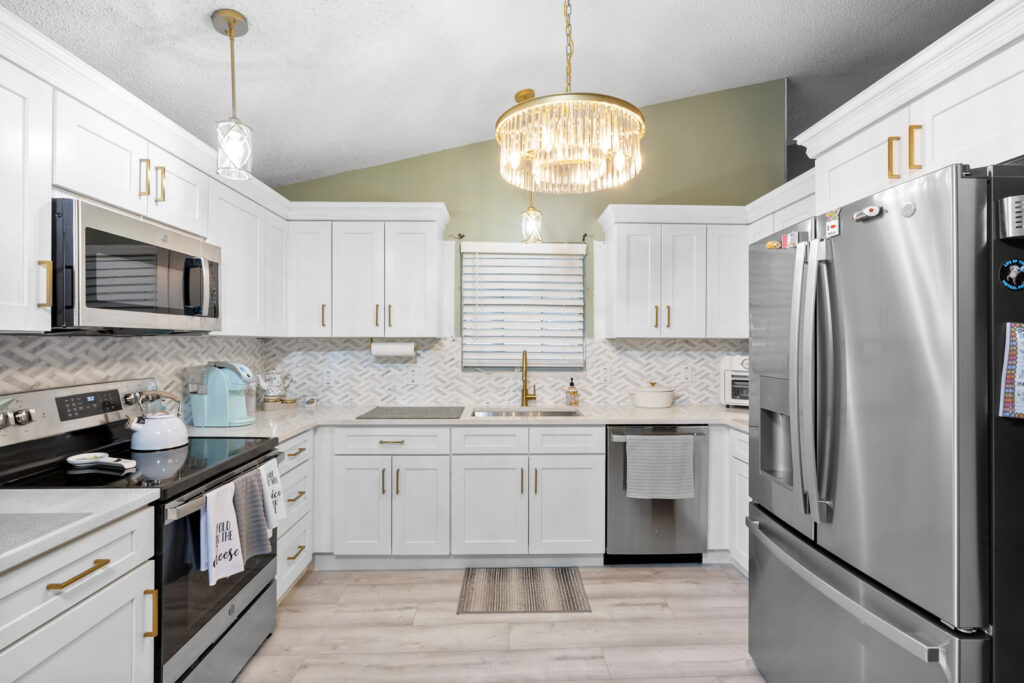 Kitchen remodel with white shelves,, wooden floor grey/white backsplash